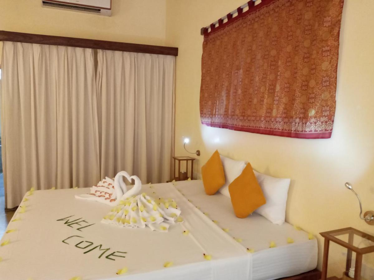 Giman Free Beach Resort Passikudah Buitenkant foto