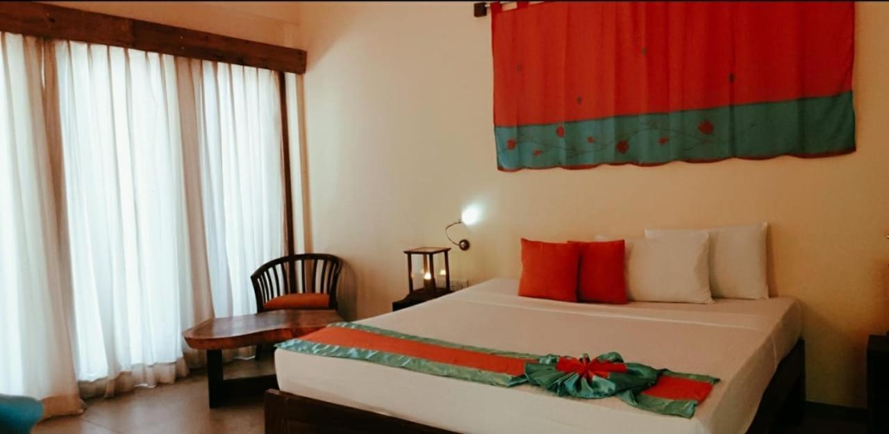 Giman Free Beach Resort Passikudah Buitenkant foto